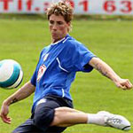 F. Torres works alone in an extra session shooting to goal