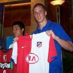 Torres came back home after winning the Chinese’s support
