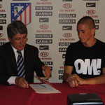 Torres sealed his commitment with Atletico until June 2009